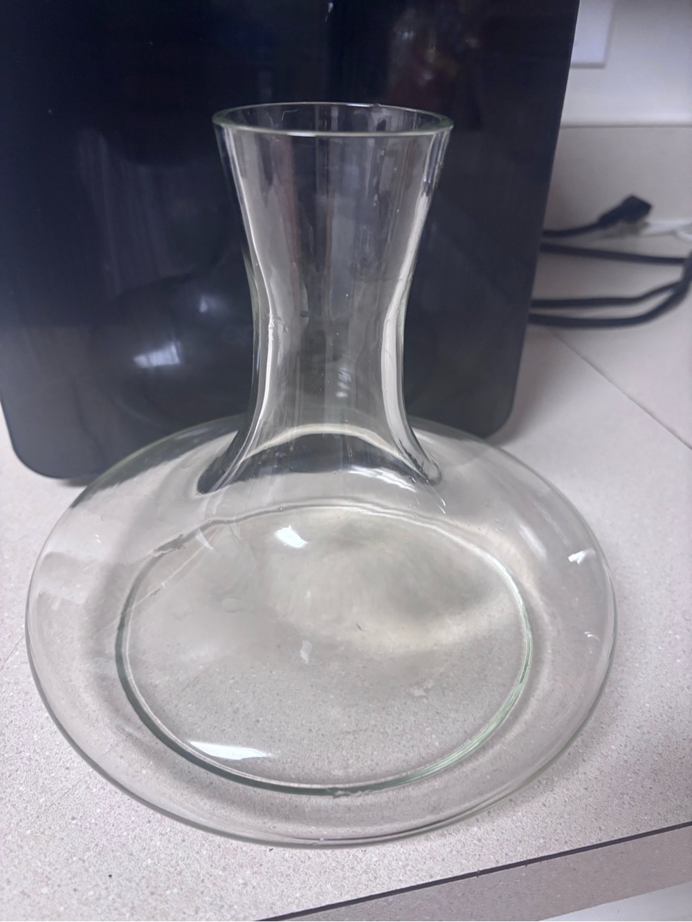 Glass vase with round base